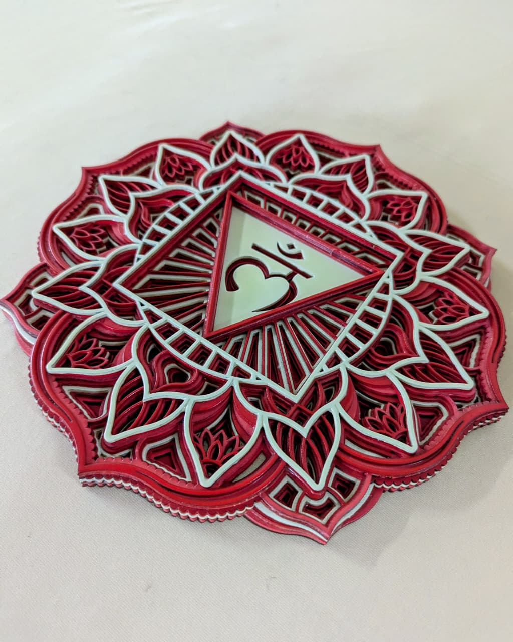 Root Chakra mandala wall art displayed in a meditation space