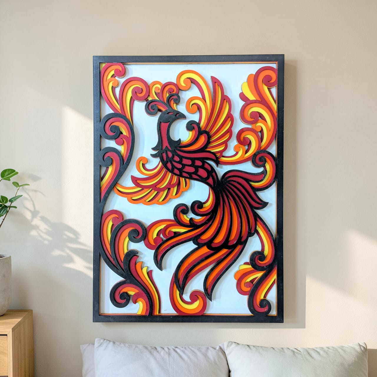Decorative wall art of a phoenix in a living room setting