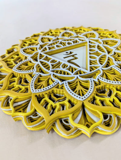 Intricate laser-cut Manipura chakra mandala detailing on wooden wall art