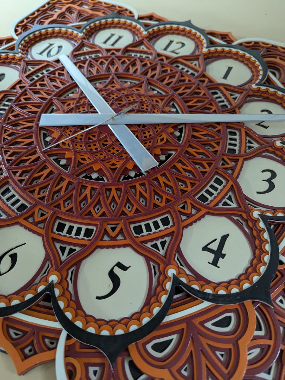 Intricate laser-cut mandala detailing on Samay Chakra wooden wall clock