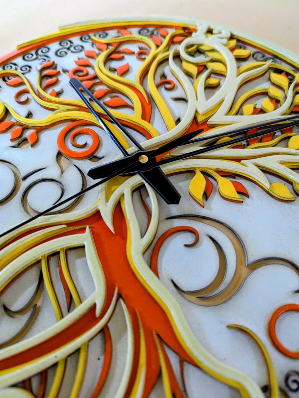 Decorative wall clock with intricate design and vibrant colors